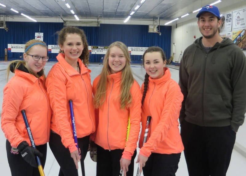 From left, Rachel Fiselier, skip; Victoria Taylor, third; McKenzie McElhinney, second; Codi Wilson, lead; and coach Mac Walton. The local rink recently travelled to