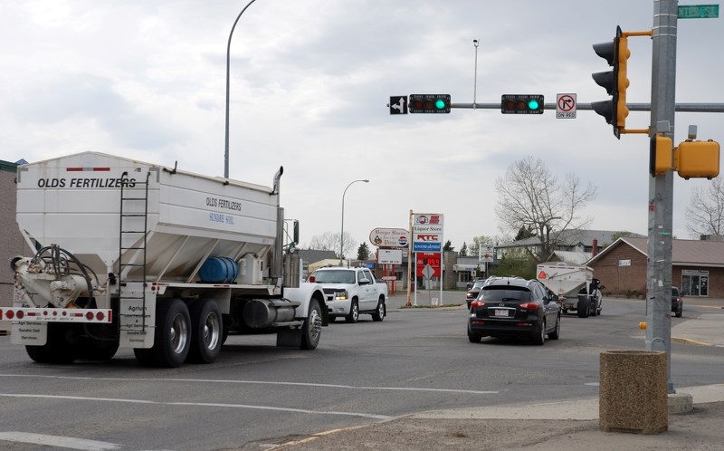 Traffic makes its way along Main Avenue on Friday, April 22. Pedestrian safety became a contentious issue following the change to four lanes in 2008. Town council recently