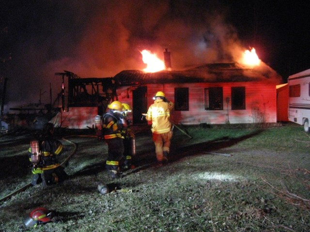 A family renting a house east of Sundre near the Highway 22 junction was not home when a fire was reported during the early morning hours of Friday, April 22 by a passing