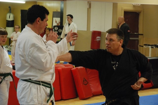 Perry Stokalko, right, instructor of a local martial arts program, is pictured here recently doing some drills with student Ryan Beck, who trains with his family. Stokalko