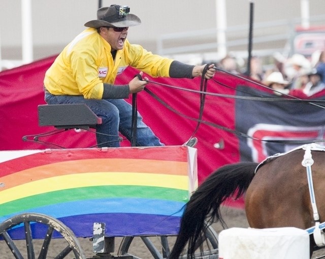 Rae Croteau Jr. rounds a barrel last year during his heat in the Calgary Stampede GMC Rangeland Derby chuckwagon races. He recently told the Round Up the adrenaline-packed