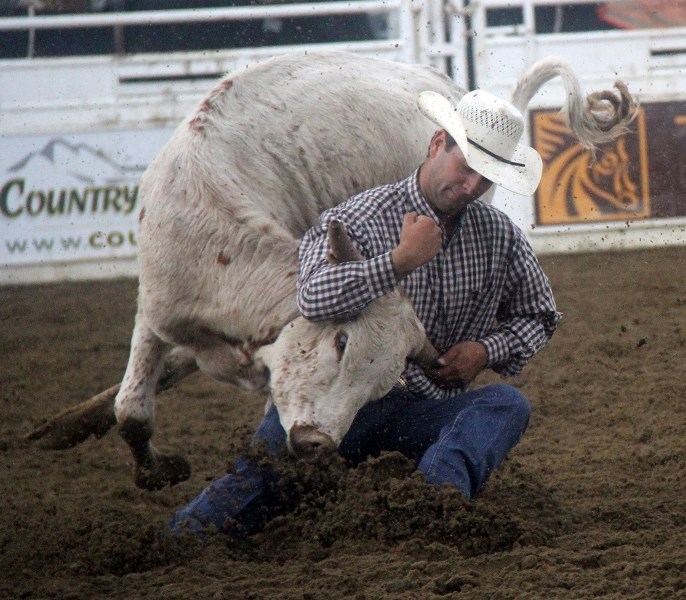 Matt Mailer, from Botha, Ab., made clocking 4.3 seconds in the June 25 afternoon steer wrestling event look easy.,