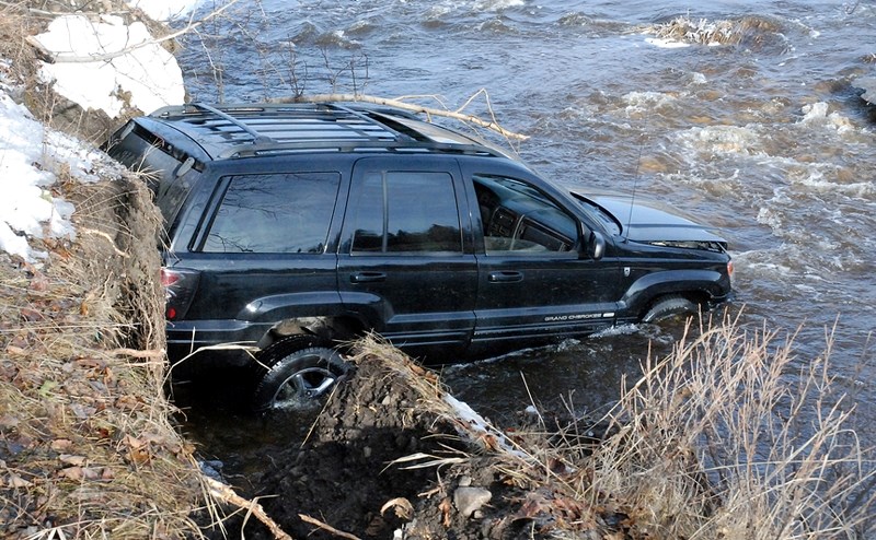 Efforts to remove a Jeep that ended up in the Bearberry Creek took the better part of the morning of Friday, March 31.