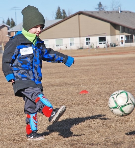 Sundre-area resident Andre Gleeson, 3, whose mom Carolyn watched from the sidelines, was among about two dozen tykes to hit the soccer fields behind River Valley School on