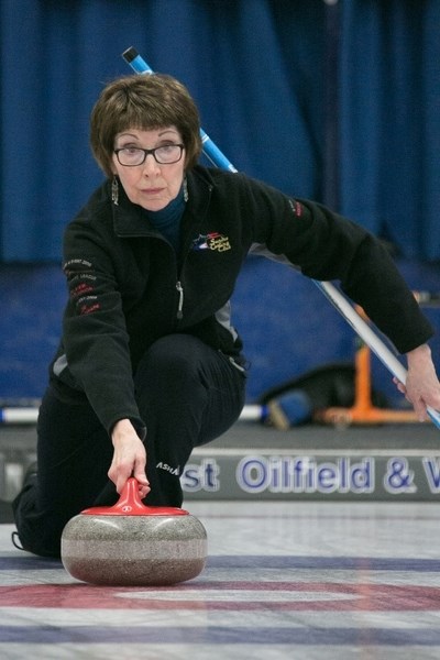 THAT&#8217;S A WRAP — Carol Hudec delivers a rock during the Sundre Curling Club&#8217;s final event of the year, which ran last week through until Sunday. She&#8217;s