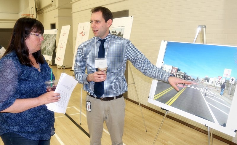 About 100 people attended an open house at the Sundre Community Centre last week to address questions regarding the impending trial redesign of Main Avenue, which will