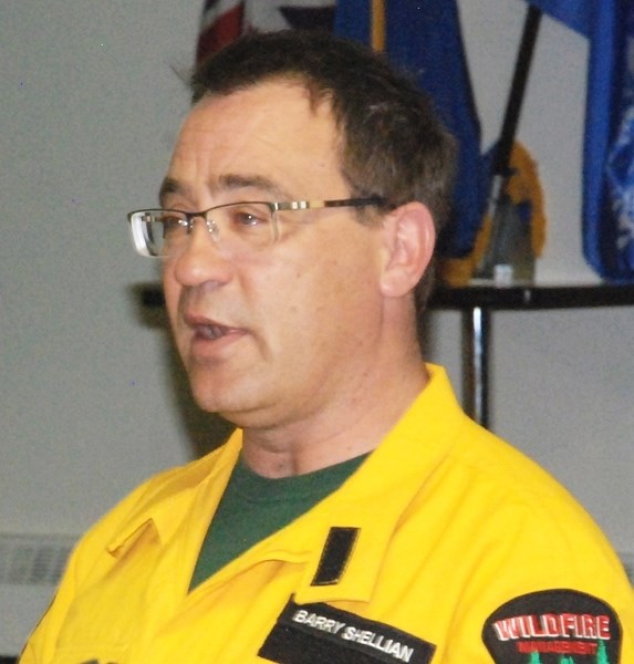 Barry Shellian, Rocky Forest Area information coordinator, addresses several dozen people during a recent public presentation about wildfire safety at the Sundre Legion.