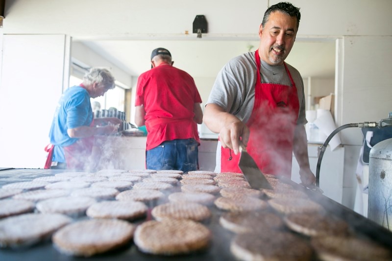 Coun. Chris Vardas was among several Town of Sundre volunteers to help out with the municipality&#8217;s free community barbecue during last year&#8217;s Canada Day