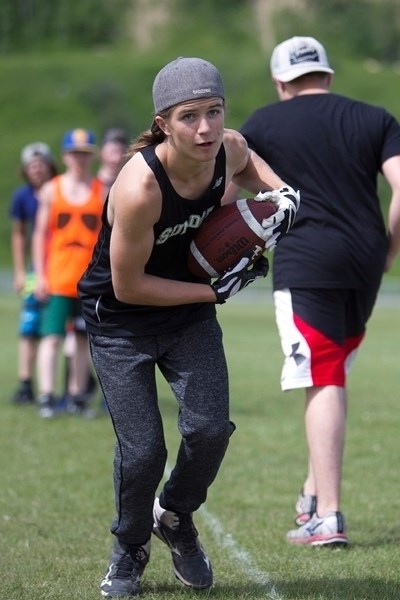 Evyn Read takes part in a drill during a recent Sundre Bisons football spring training camp.