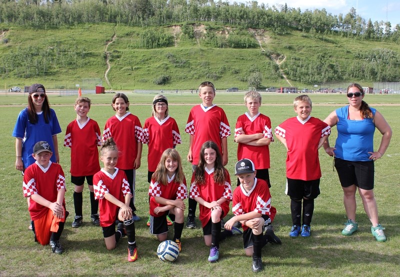 The Sundre U-12 competitive soccer squad recently placed fourth in their division finals held Saturday, June 24 in Irricana. The team is pictured here at the local fields.