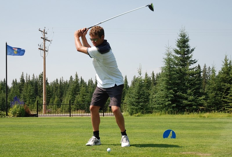 Sundre resident Marc Gamelin tracks his shot after driving off of Hole No. 4 at the Coyote Creek Golf and RV Resort on Saturday, July 29 during the inaugural Play 4 Kidz