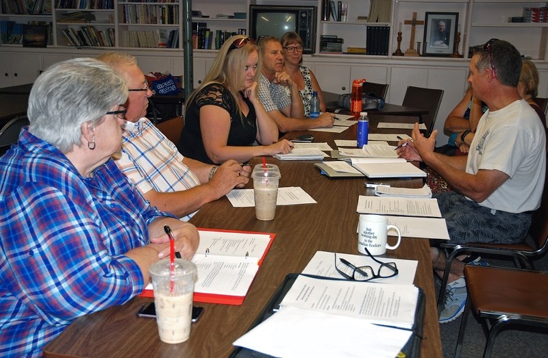 Sundre RCMP detachment&#8217;s Sgt. Jim Lank, right, has played an instrumental role in helping members of the community to organize and re-establish a local Citizens on