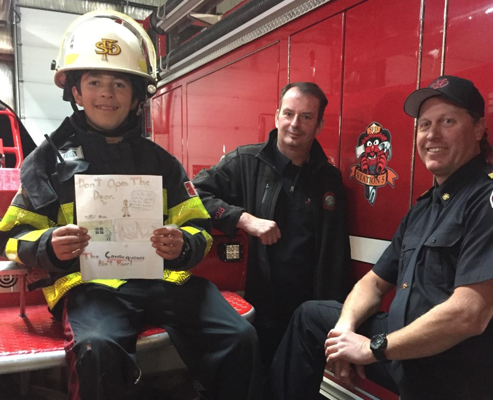 Grade 7 student Chandler Dziadek earned the title of Sundre Junior Fire Chief For a Day for his winning entry in River Valley School&#8217;s annual poster contest that