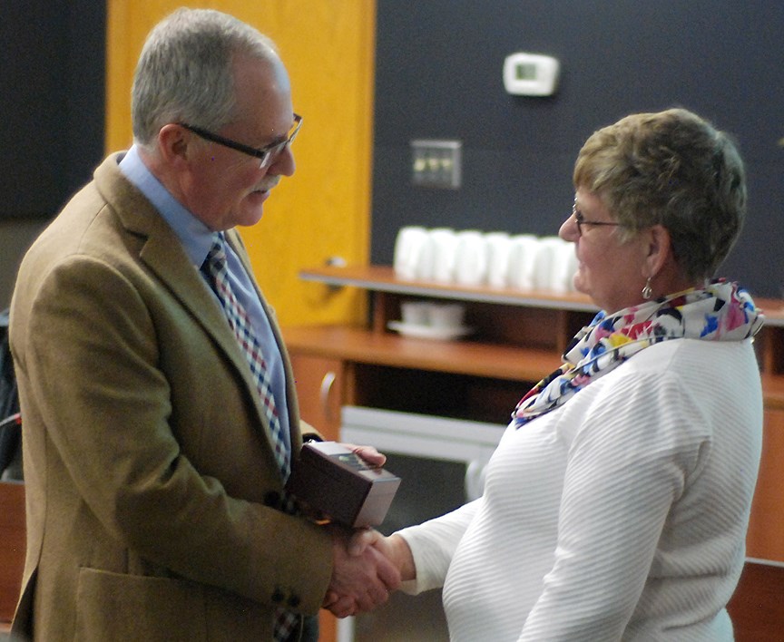 On behalf of the municipality, Mayor Terry Leslie recognized the contributions of former councillors during the Jan. 15 meeting. He is pictured shaking hands with Verna