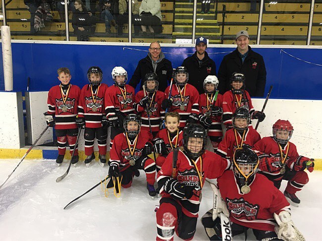 The Sundre novice Huskies triumphantly emerged victorious to win gold at a tournament in Olds after going undefeated following four games.