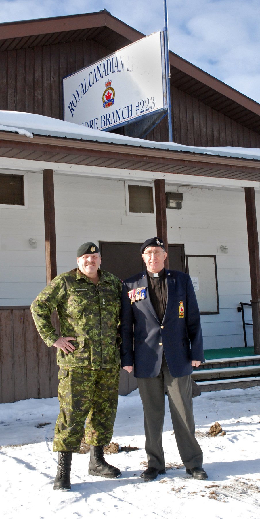 Sundre resident and the senior pastor at the Main Avenue Fellowship, Todd MacDonald, left, who is also the lieutenant and chief training officer for the Didsbury Army Cadets