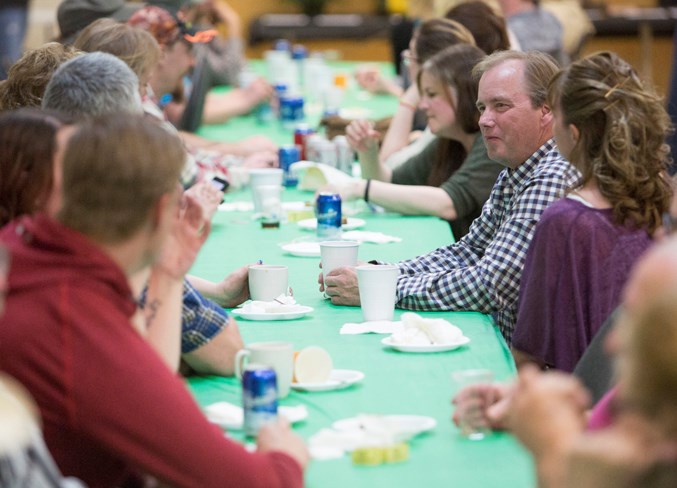 Attendees visit during the event.