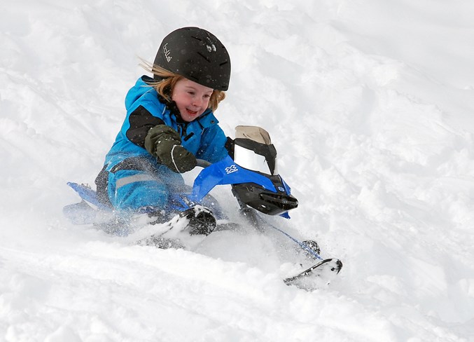  Maeve Petersen, 4, was among a group of children who took advantage of Friday's heavy snow fall to go sledding at Snake Hill. Simon Ducatel/MVP Staff