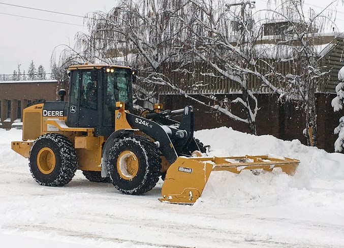  The Town of Sundre road crew was busy clearing roads on Friday following a substantial snow fall of more than 30 centimetres, which prompted the Chinook's Edge School Division to cancel classes for the day at numerous schools, including Sundre. Simon Ducatel/MVP Staff