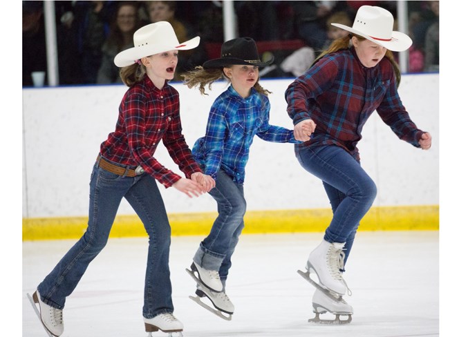  From left, Carlee Clark, Emily Luzi and Brooke Tobin perform to the song Redneck Girl.