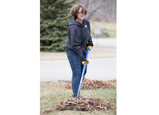  Grade 9 student Samantha Turner rakes leaves. Noel West/MVP Staff