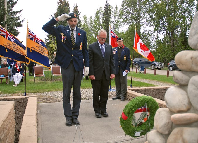  Sergeant-at-arms Jamie Moffatt salutes after Mayor Terry Leslie laid a wreath in front of the cenotaph.