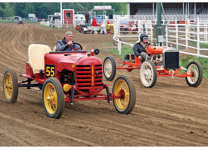  Bruce Brander, from James River, behind the wheel of No. 55, comes around a corner with Harry Lillo, from Chestermere, driving the Orange Crush, hot on his heels.