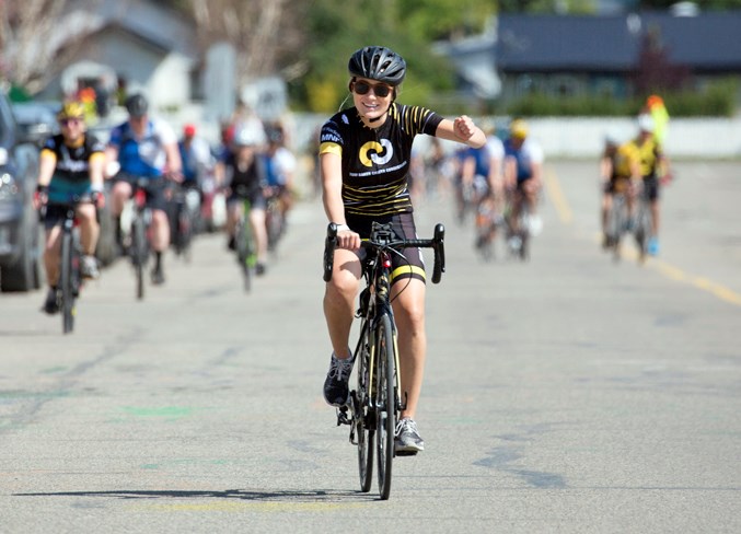  Riders make their way through Sundre on Saturday during the 11th annual Alberta Ride to Conquer Cancer.