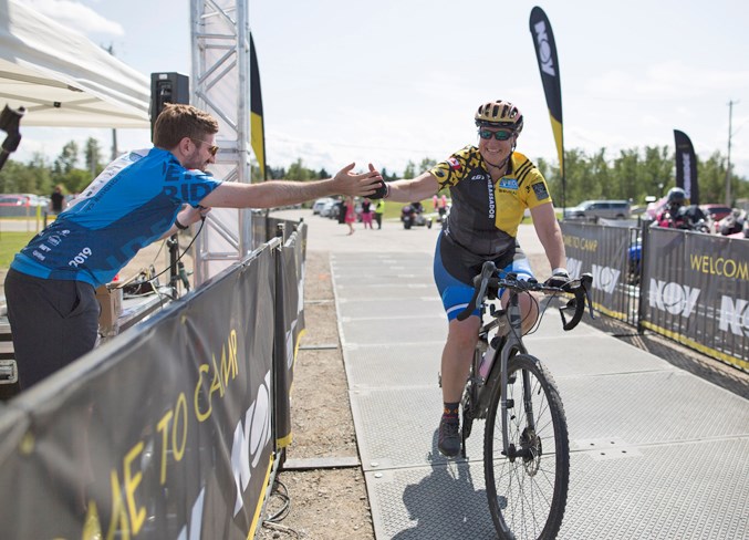 A rider crosses the finish line during the event.