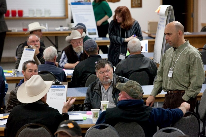 County residents discuss development issues with Red Deer County staff during an open house at Spruce View Thursday night.