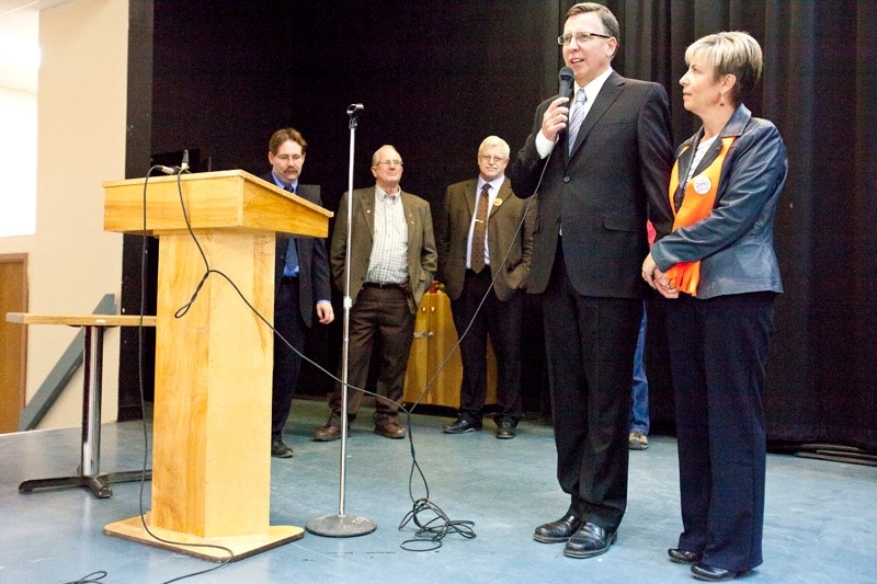 Darcy Davis makes his acceptance speech in Didsbury on Nov. 26 with wife Nora at his side. Behind from left are candidate William Stevenson