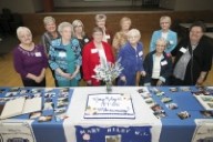 Members of the Mary Riley WI branch are all smiles.