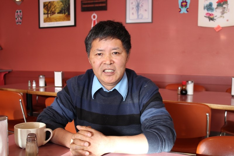 Joseph Shi at his restaurant in Cremona. Shi came to Canada in 2000 as a refugee from China.