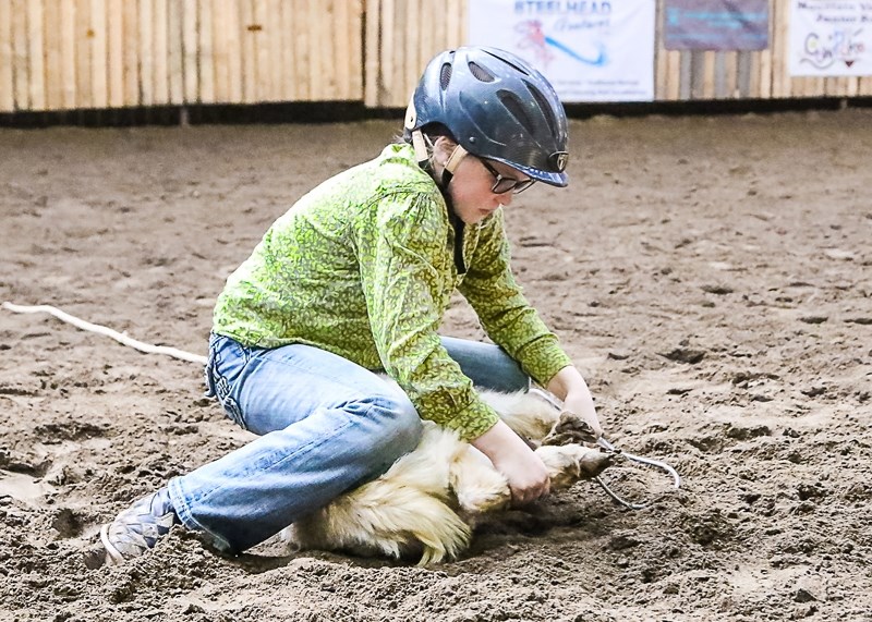 Casey Cyrankiewicz competes in the goat tying event during the March 25 rodeo.