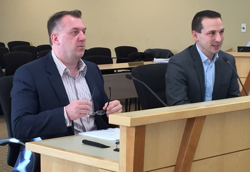 Olds College&#8217;s Dr. Jason Dewling, left, vice president academic and research, and Mark McLoughlin, executive director campaign, speak with the policies and priorities