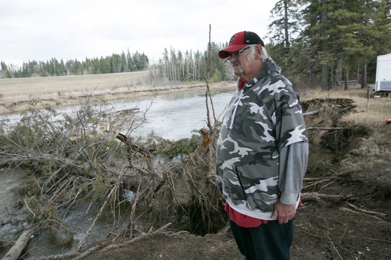 Long-time Westward Ho campground manager Gord Toews stands on the banks of the Little Red Deer River at the camp last week.