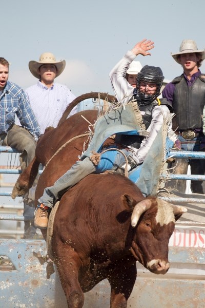 Klay Lanigan competes in the bull riding section at the Didsbury FCA rodeo last weekend.