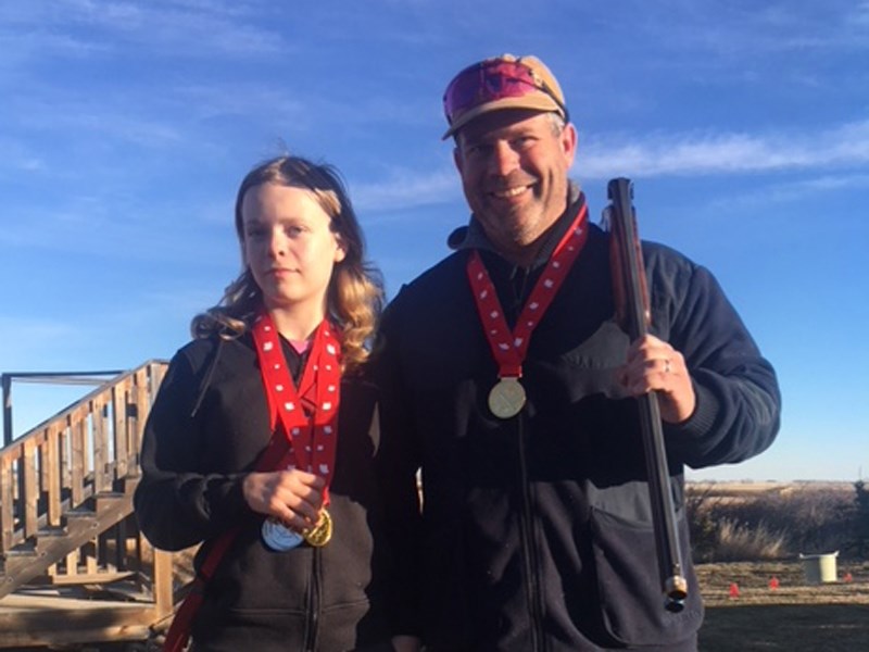 Jason DeJong won high overall at the Silver Willow Annual Toy Drive Shoot, while daughter Julia won first in sub-junior, second in ladies and third in E Class.