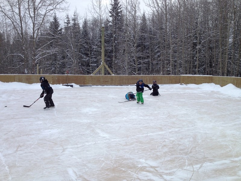 Kids and adults enjoy the new Water Valley rink.