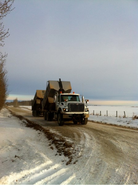 Crew pour gravel on a road last week.