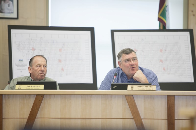 MVC councillors Bob Orr and Paddy Munro during a recent council meeting.