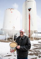 Bob Mastin holds barley.