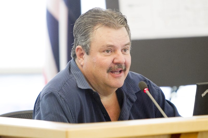 Councillor Kevin Good takes part in council talks.