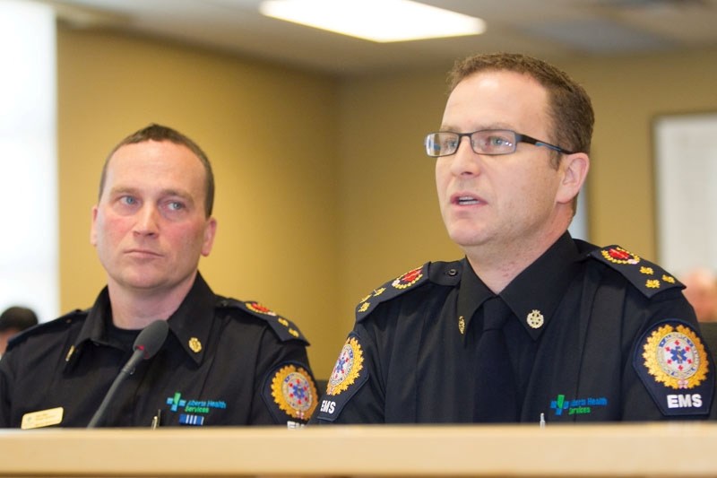 Nicholas Thain, right, and Donald Allan speak to the committee.