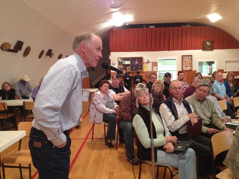 Guests listen to discussions during the open house.