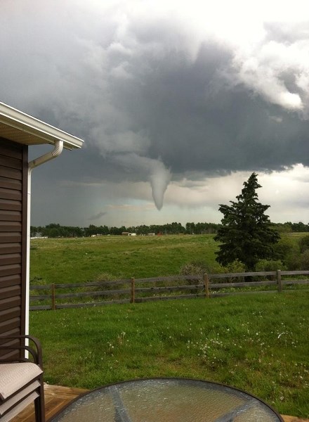 A tornado moves through the Cremona area on June 27.