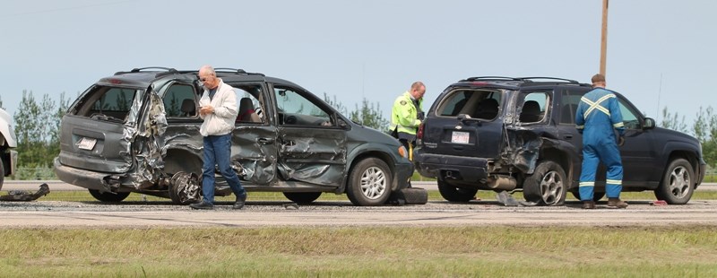 Two of the vehicles damaged in a QEII crash.