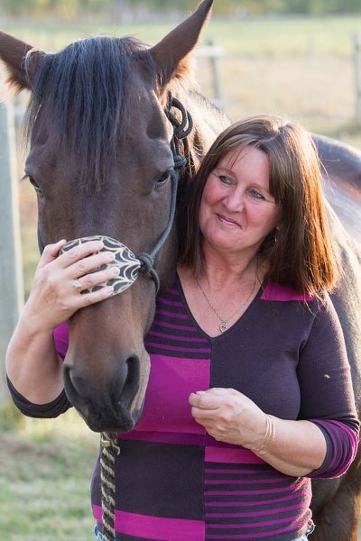 Dawn Brooks and quarter horse Cuervo