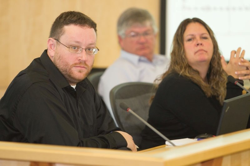 Councillors Sayer, McKean and Milne listen at the recent public hearing