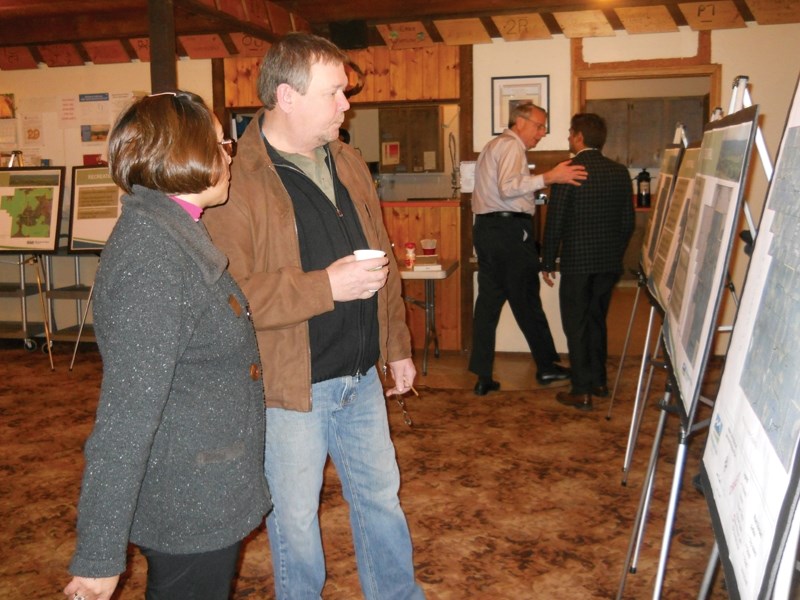 Guests talk during an open house at the Water Valley Hall.